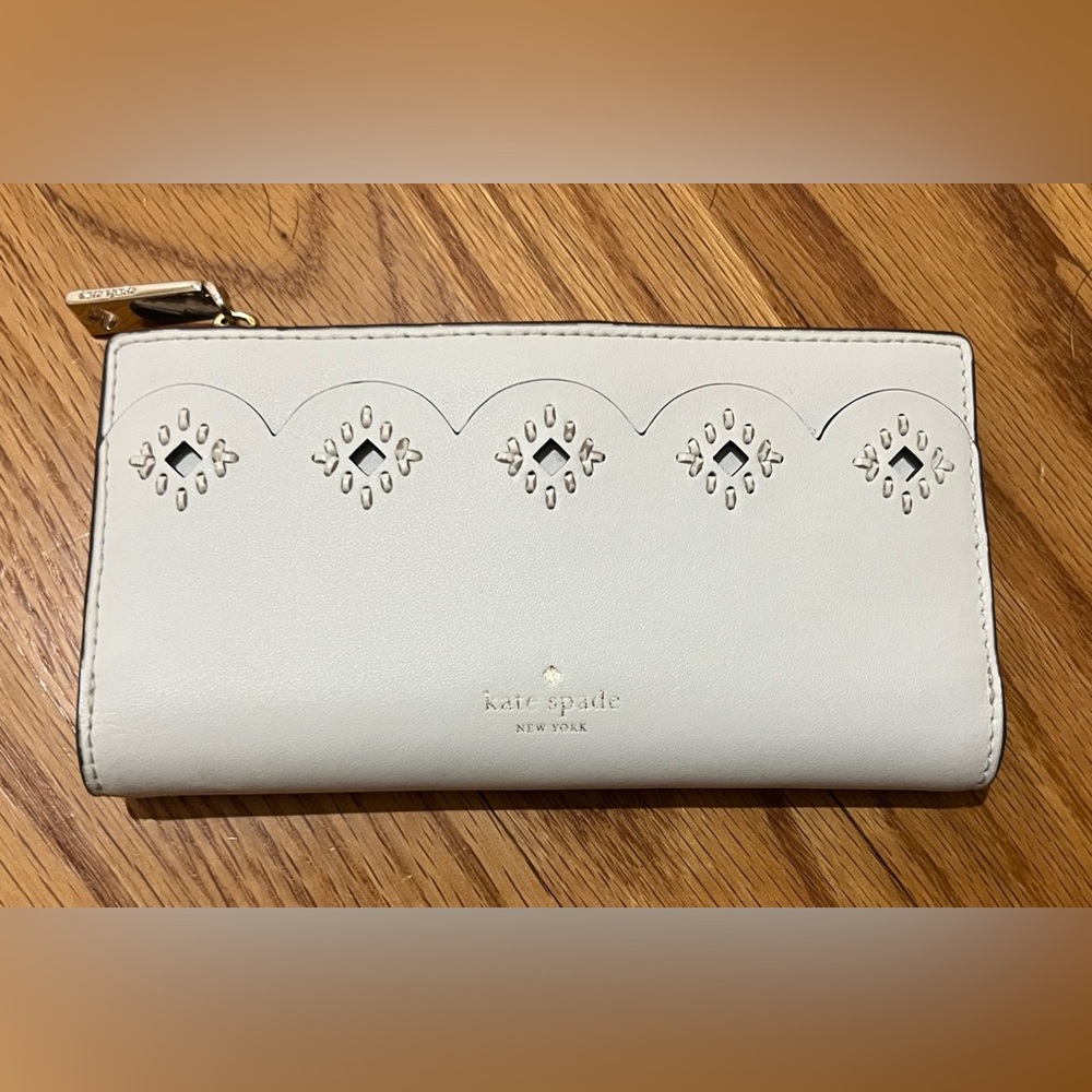Kate Spade White Clutch with Cutout Design